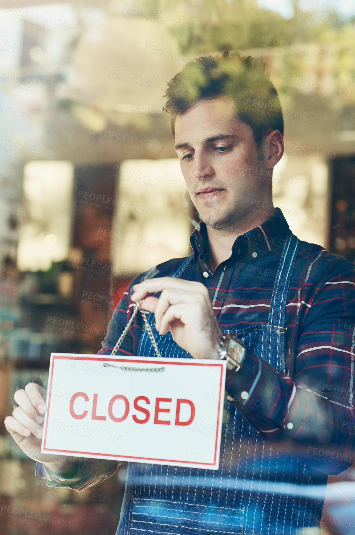 Buy stock photo Closed, sign and waiter at door of store for restaurant, information and notification of service. Coffee shop, man and person with board by window for small business, hospitality and end of work day