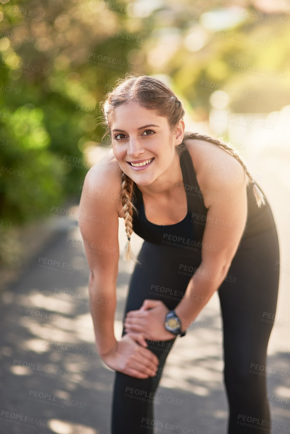 Buy stock photo Portrait of an attractive young woman smiling after her morning run