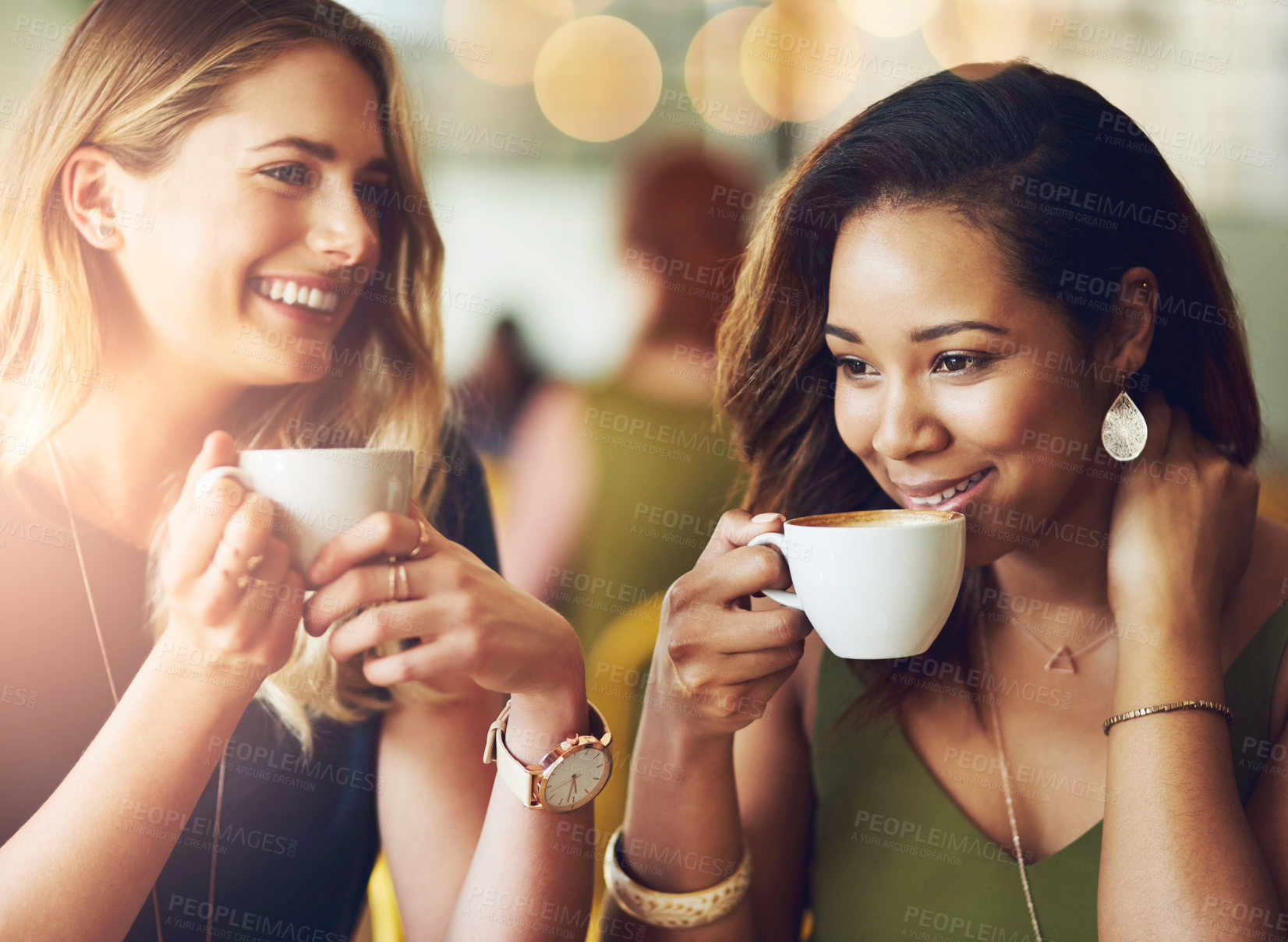 Buy stock photo Women, friends and drinking in coffee shop or laughing for reunion connection or restaurant, relax or caffeine. Female people, cup and chatting together in cafe with funny joke, humor or espresso