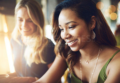 Buy stock photo Cropped shot of a beautiful young woman sitting in a cafe