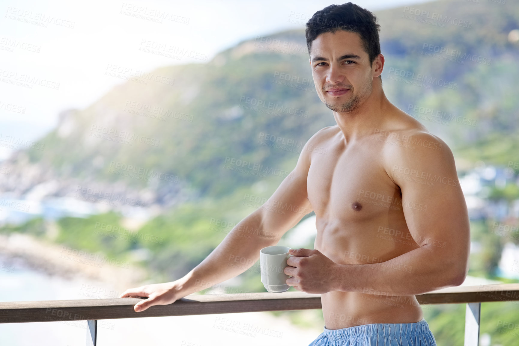 Buy stock photo Balcony, portrait and man with coffee cup in morning on vacation, weekend holiday and shirtless in Bali. Smile, hot beverage and cappuccino with guy outdoor to relax, fresh air and pride in hotel