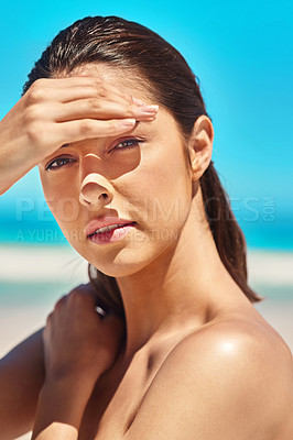 Buy stock photo Shot of a beautiful young woman at the beach