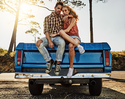 Buy stock photo Portrait of an affectionate couple spending the day outdoors