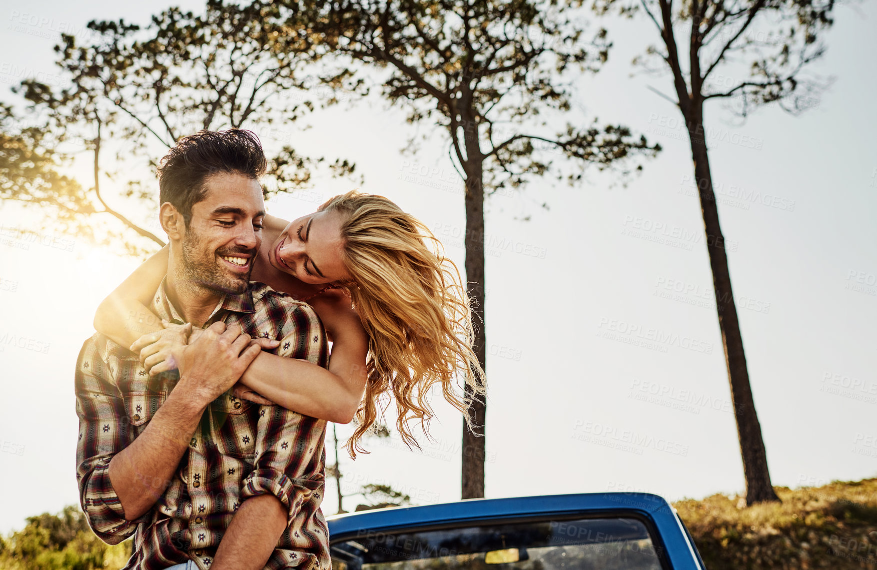 Buy stock photo Shot of an affectionate couple spending the day outdoors