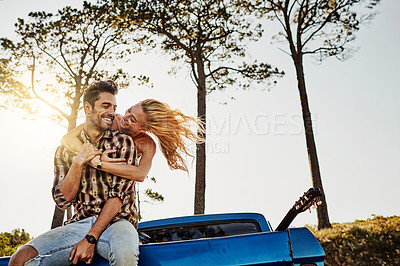 Buy stock photo Shot of an affectionate couple spending the day outdoors