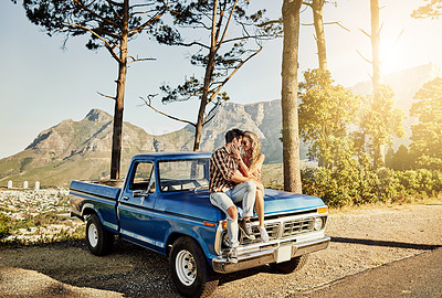 Buy stock photo Shot of an affectionate couple spending the day outdoors