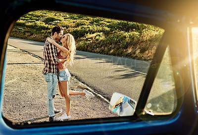 Buy stock photo Shot of an affectionate couple spending the day outdoors