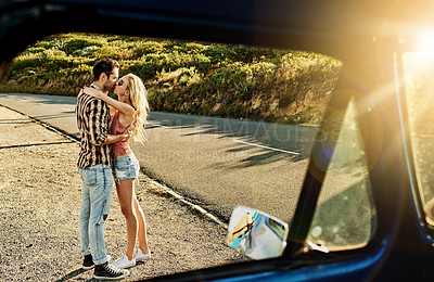 Buy stock photo Shot of an affectionate couple spending the day outdoors