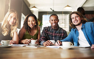 Buy stock photo Portrait of a group of friends catching up over coffee in a coffee shop