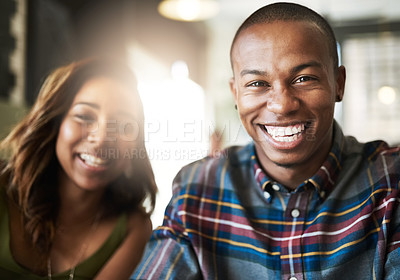Buy stock photo Portrait of a happy young couple in a coffee shop
