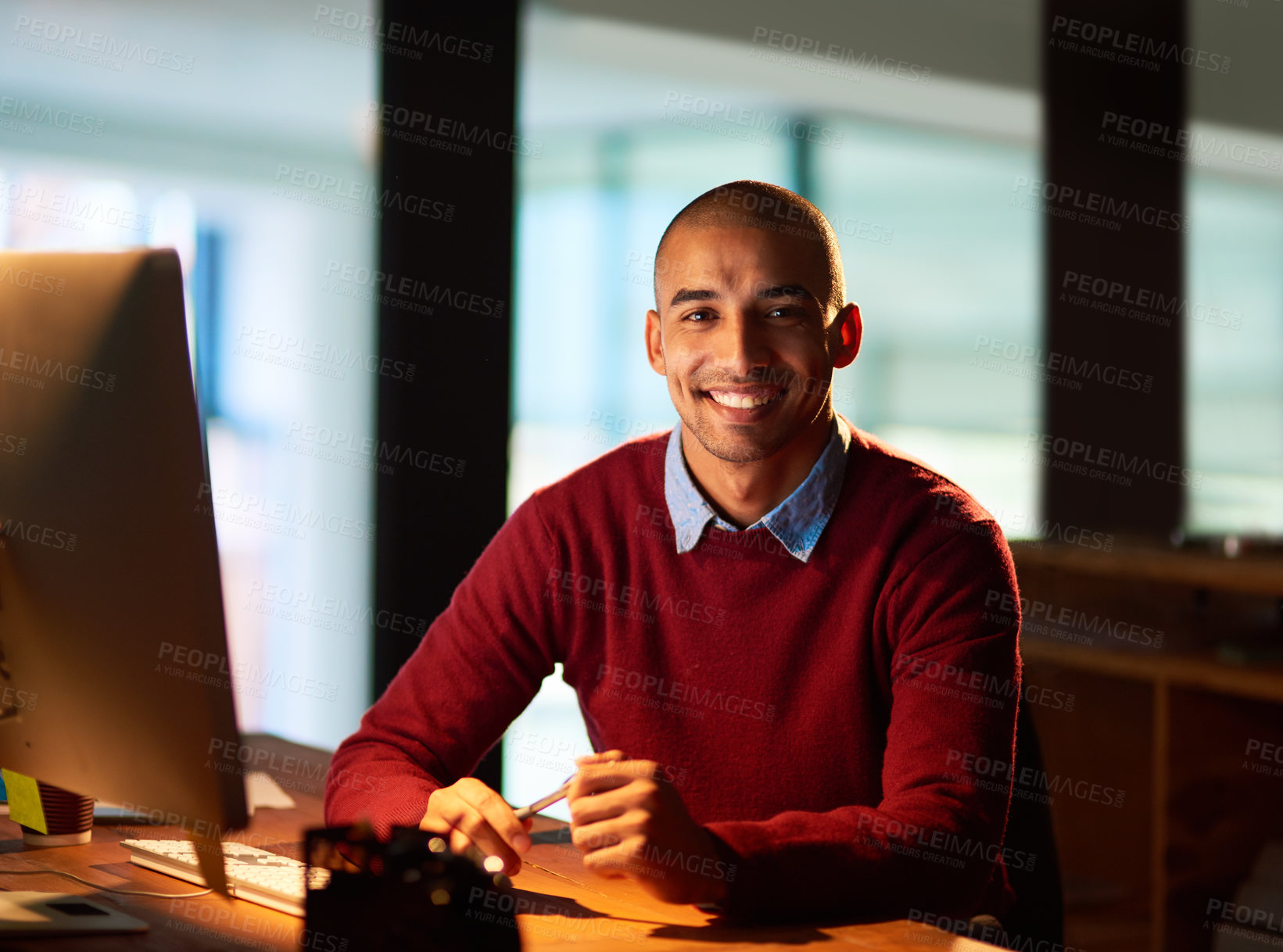 Buy stock photo Night, smile and portrait of businessman with computer, confidence and online project management. Pride, internet research and consultant at desk with happy face, professional career and dark office