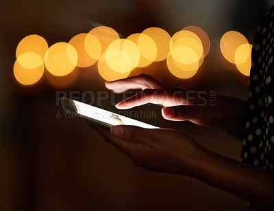 Buy stock photo Cropped shot of an unrecognizable person using a cellphone