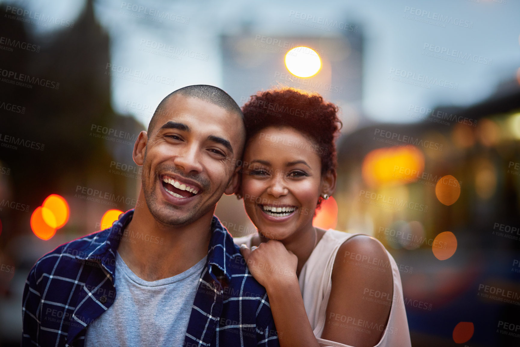 Buy stock photo Happy couple, portrait and hug or city for night downtown or relationship date, bokeh or evening. Man, woman and embrace in New York for holiday adventure with urban sightseeing, love or marriage