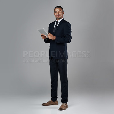 Buy stock photo Studio shot of a corporate businessman against a grey background