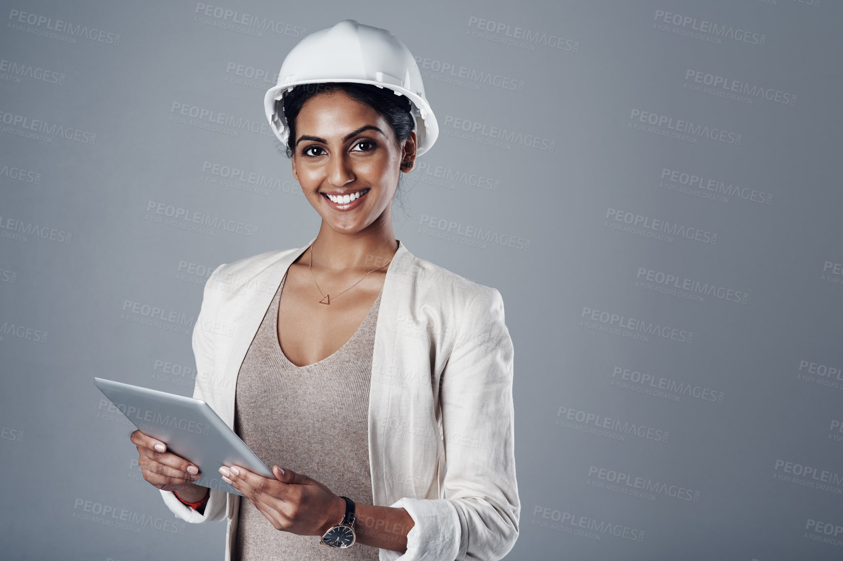 Buy stock photo Architect, portrait and tablet in studio for construction, communication and renovation progress update. Engineering, tech and woman on gray background for project, research and architecture report