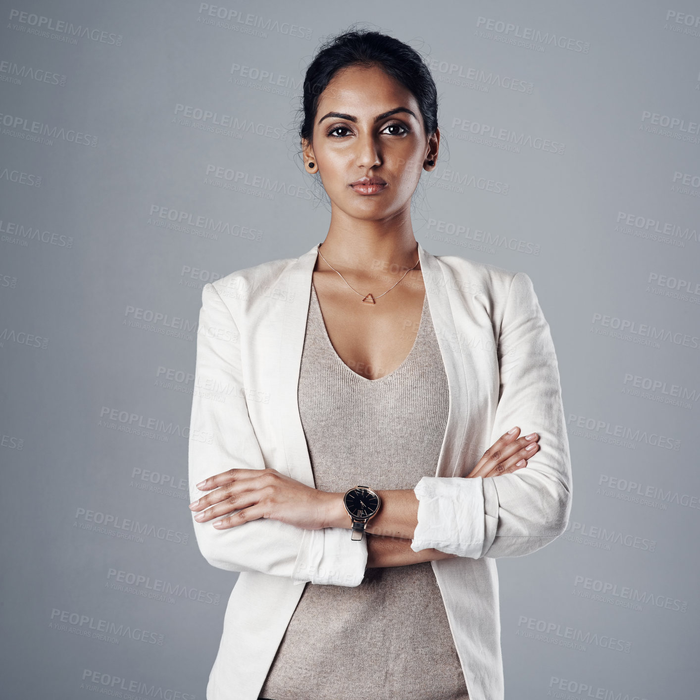 Buy stock photo Confidence, portrait of a businesswoman with her arms crossed and against a studio background for elegance, Assertive or proud, professional or leadership and female person pose for empowerment