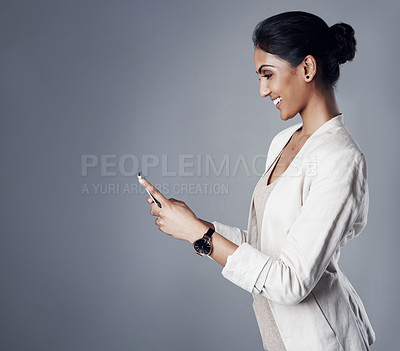 Buy stock photo Business, employee and woman with a cellphone, connection and social media on a grey studio background. Female person, advertising agent and model with a smartphone, website information and contact