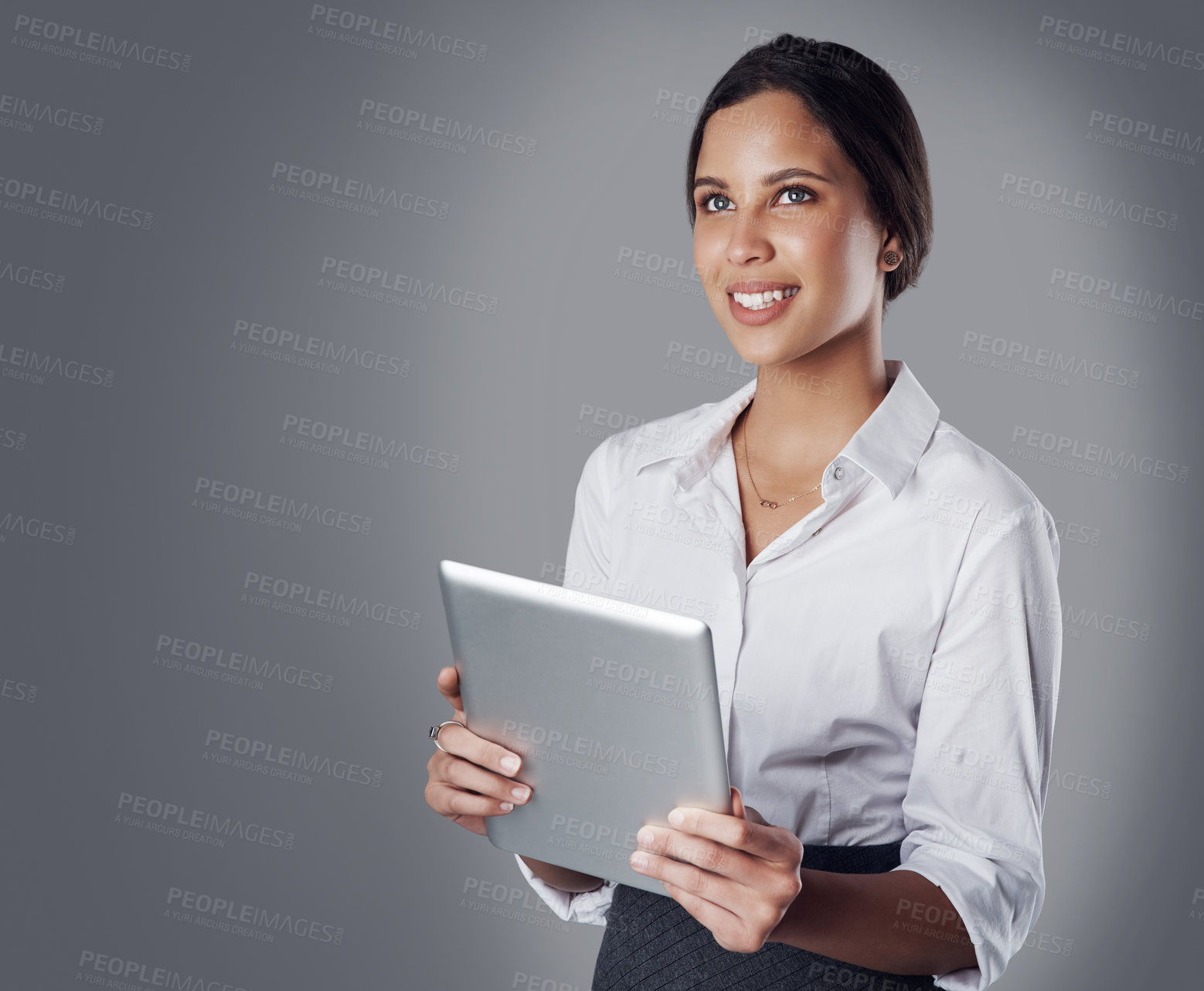 Buy stock photo Woman, thinking and tablet in studio space for planning, research or small business development. Entrepreneur, tech or brainstorming on gray background for startup growth, website update and feedback