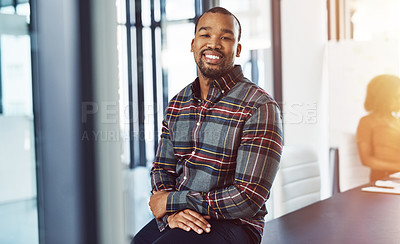 Buy stock photo Shot of a businessman posing  in a boardroom