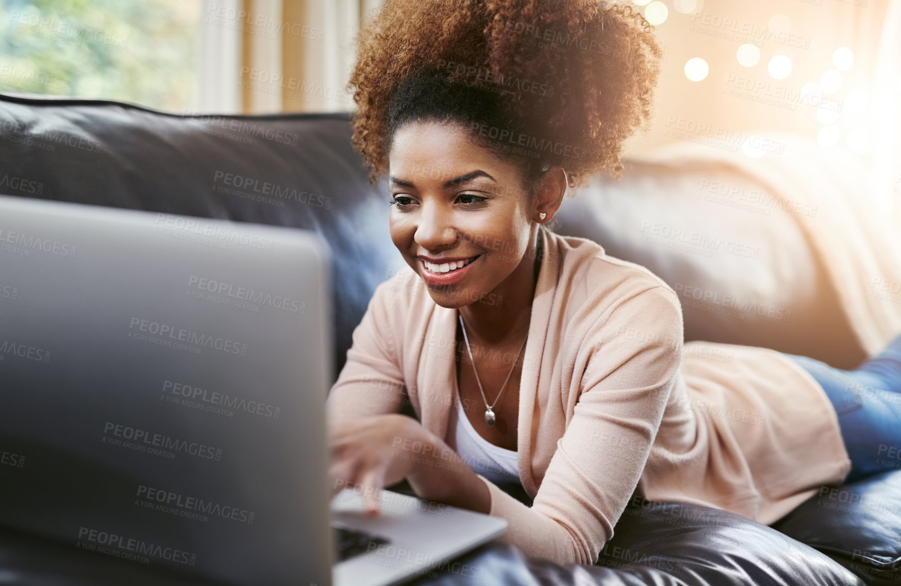 Buy stock photo Black woman, laptop and home couch or online shopping as subscription in lounge, streaming or movie. Female person, technology and website search or internet connection on digital app, relax or film