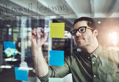 Buy stock photo Businessman, writing or reminder with glass board for brainstorming, agenda or schedule planning at office. Man, creative or employee with sticky note for startup project, tasks or ideas at workplace