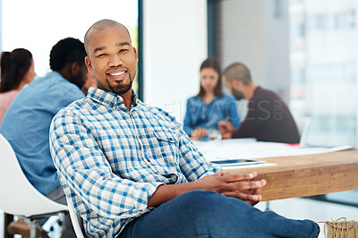 Buy stock photo Portrait of a handsome young man sitting in the boardroom during a meeting