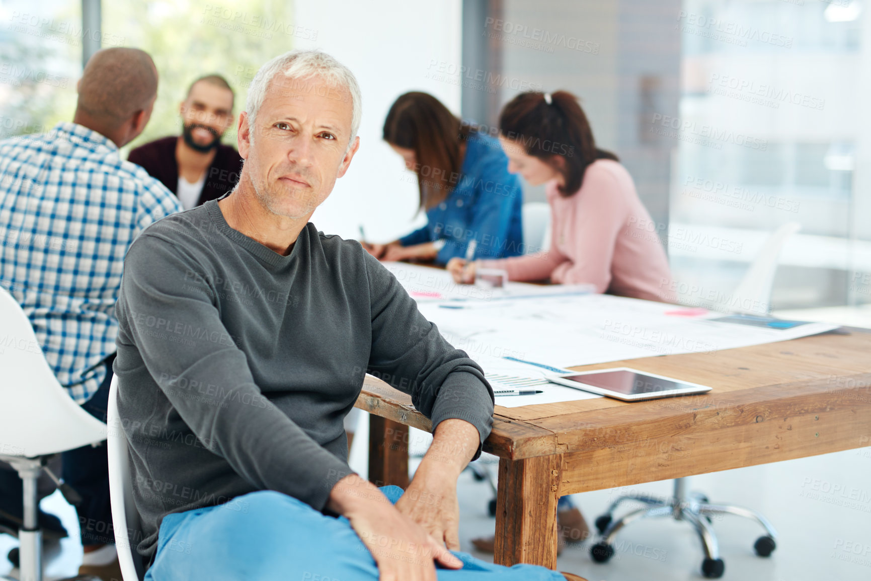 Buy stock photo Planning, office and portrait of mature businessman for meeting, conversation and discussion for project feedback. Ideas, creative company and worker at desk for teamwork, collaboration and working