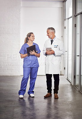 Buy stock photo Doctor, healthcare and medical team talking in a hospital a clipboard and tablet for health insurance. Senior chief and nurse or a man and woman together for a discussion, results and planning