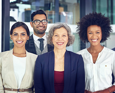 Buy stock photo Portrait of a team of corporates standing together in an office