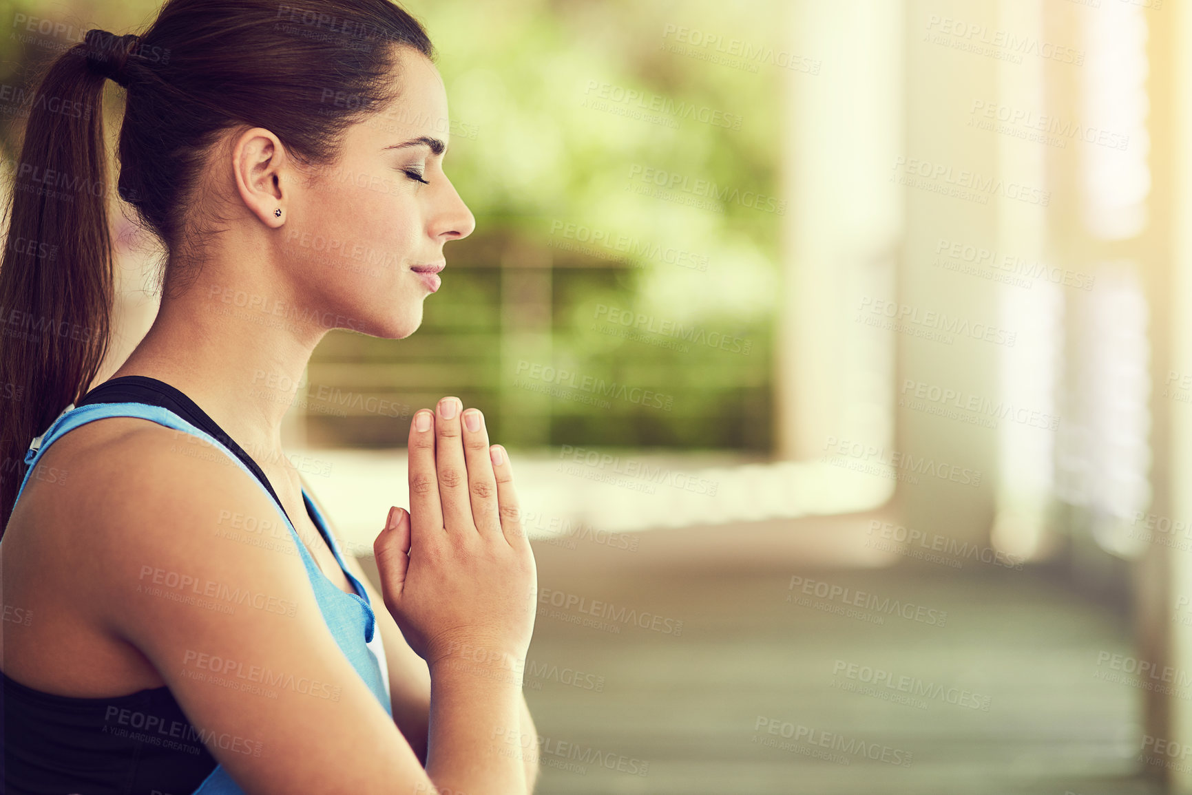 Buy stock photo Woman, yoga and praying hands with eyes closed for meditation, zen break and outside for wellness activity. Spiritual, peace and energy or chakra for body balance, mindfulness and yogi awareness