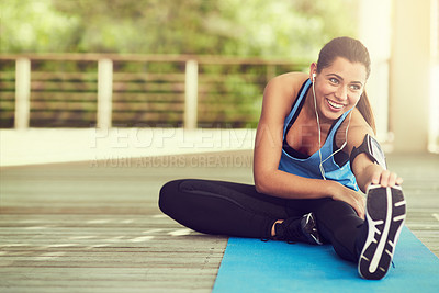 Buy stock photo Shot of an attractive young woman working out