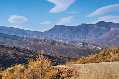 Buy stock photo Road, mountains and environment with nature, rugged terrain and adventure with journey. Empty, travel and hills with Australia desert, ecology or plants with landscape, arid and sunshine with flora