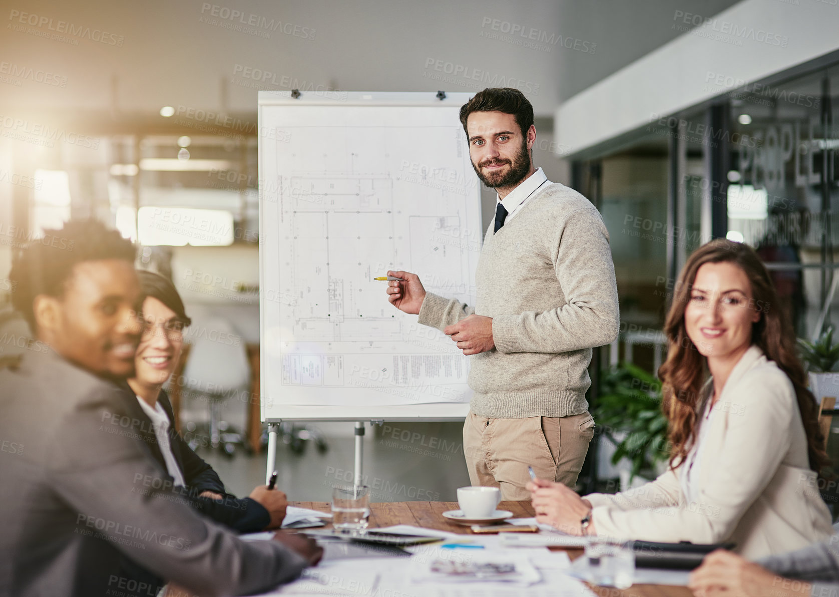 Buy stock photo Man, business and presentation in office for meeting or strategy, conversation with leader for collaboration. Male manager and colleagues in workplace for planning or teamwork, pitch for company