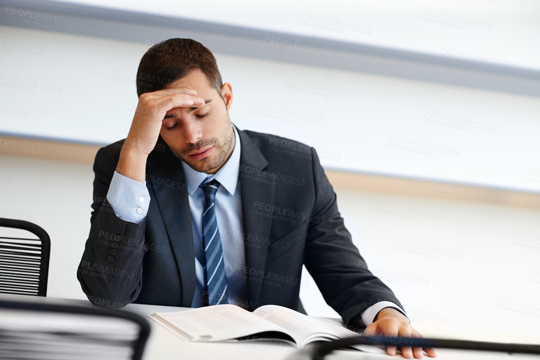 Buy stock photo Tired businessman, headache and documents with stress in anxiety, fatigue or debt at office. Frustrated man, accountant or employee with migraine in depression, bankruptcy or financial crisis at desk