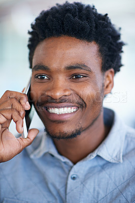 Buy stock photo Happy, black man and consulting with phone call for friendly discussion, chat or proposal at office. Young African, male person or agent talking on mobile smartphone for online advice or conversation