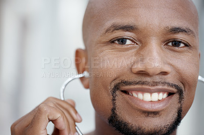 Buy stock photo Friendly African-American doctor smiling at the camera - portrait