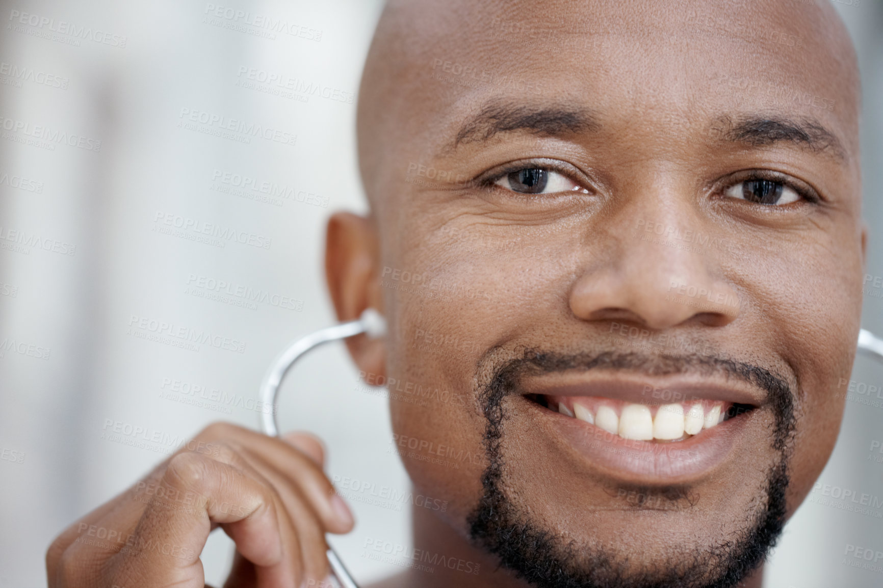 Buy stock photo Friendly African-American doctor smiling at the camera - portrait
