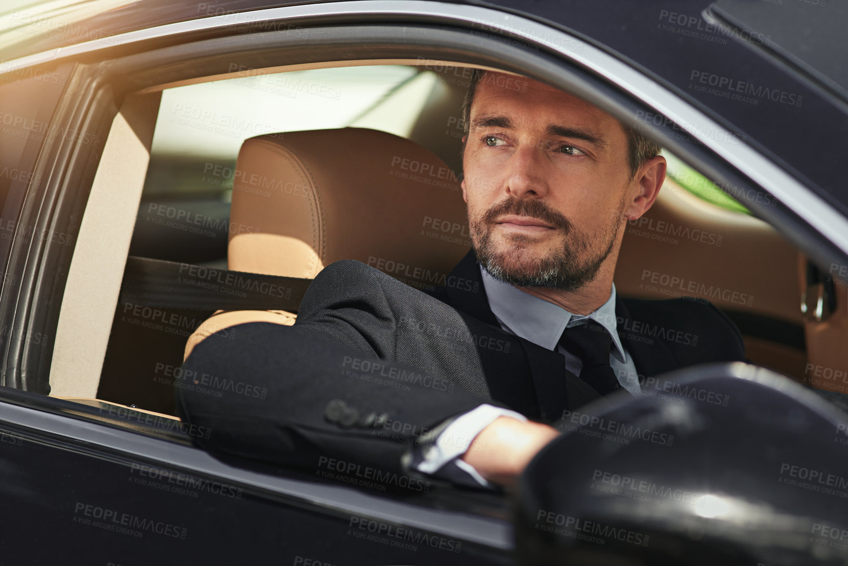 Buy stock photo Cropped shot of a businessman on his morning commute to work