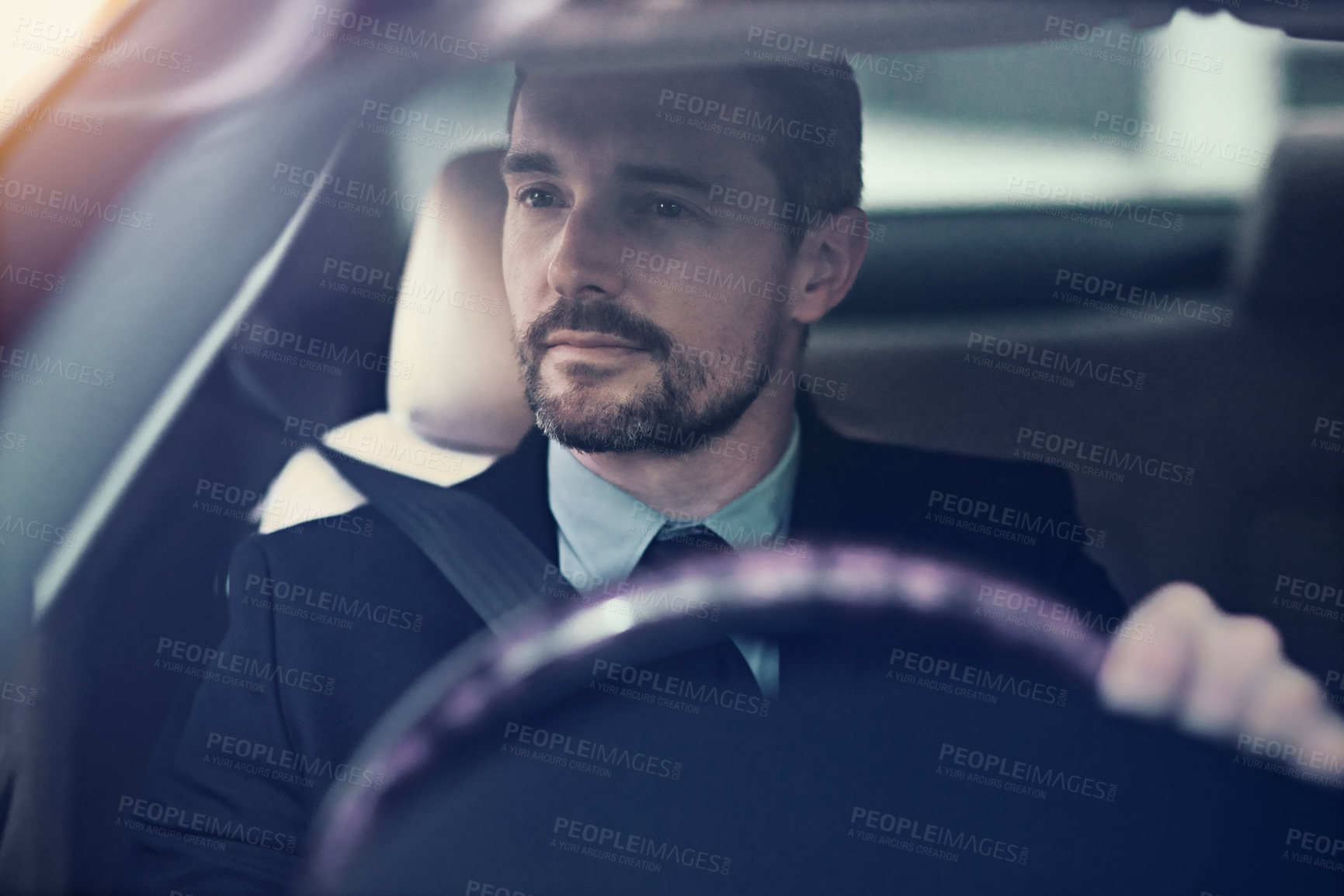 Buy stock photo Businessman, thinking and driving in car for travel for commute to corporate work or job as entrepreneur of company. Man, motor vehicle and daily journey with transportation, traffic and on route.