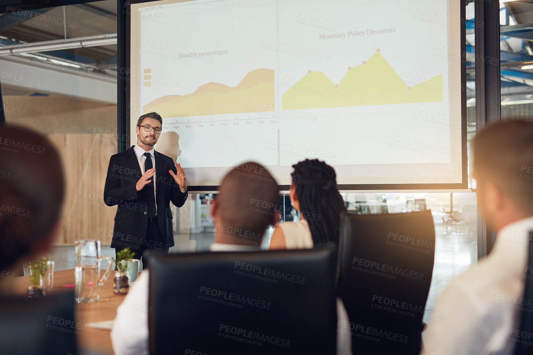 Buy stock photo Businessman, presentation and audience meeting with charts in boardroom or financial analysis, graphs or report. Colleagues, screen and review of stock market for project budget, investment or growth