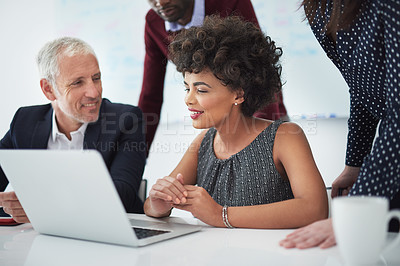 Buy stock photo Collaboration, laptop and business people in meeting in office for online research, website and internet. Teamwork, corporate workers and men and women on computer for planning, reading news or email