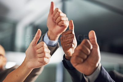 Buy stock photo Closeup shot of a group of businesspeople giving thumbs up together