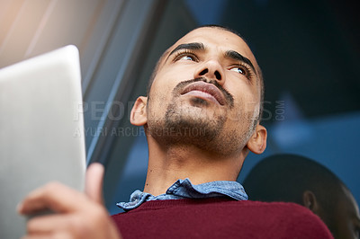 Buy stock photo Creative, man and thinking with tablet in office for designing software for company or agency and thoughts of ideas. Male employee, digital technology and wonder with inspiration for new website apps