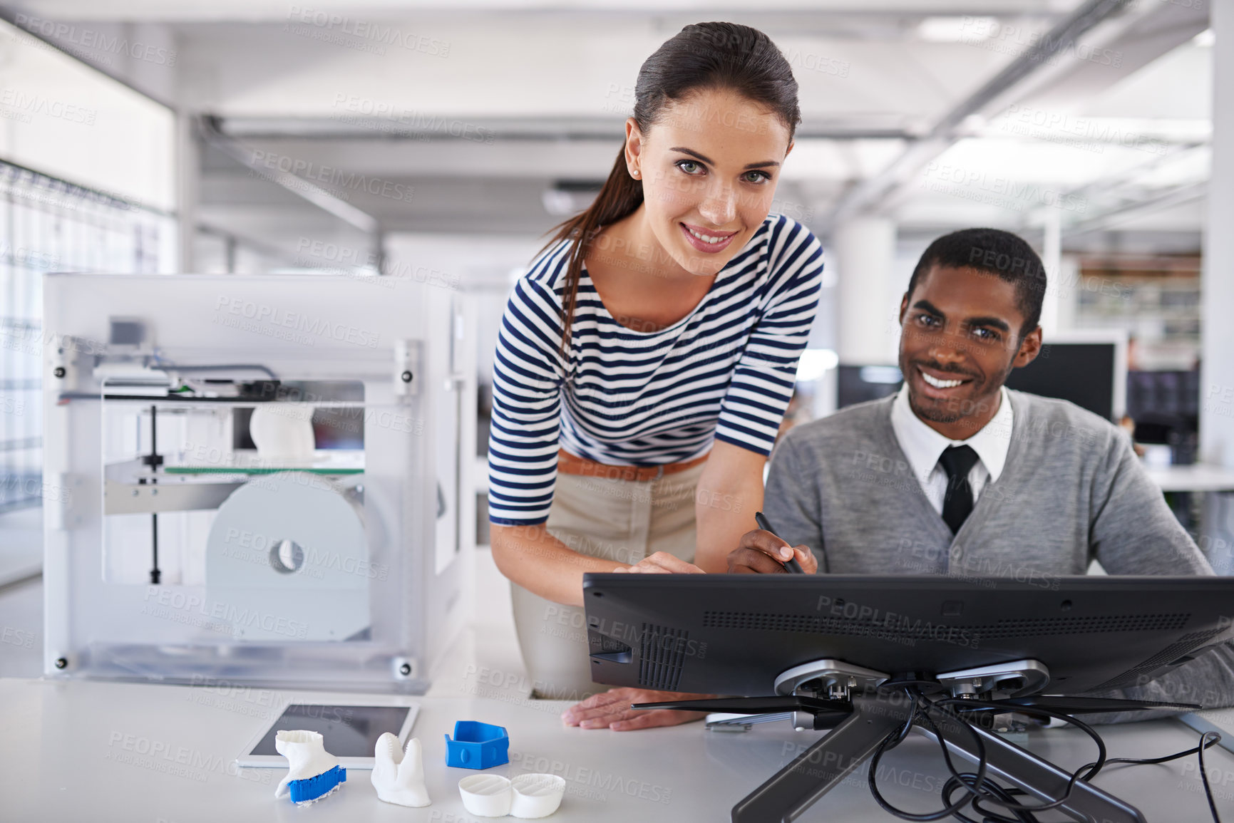 Buy stock photo Portrait of two colleagues working together with a touchscreen computer and a 3d printer