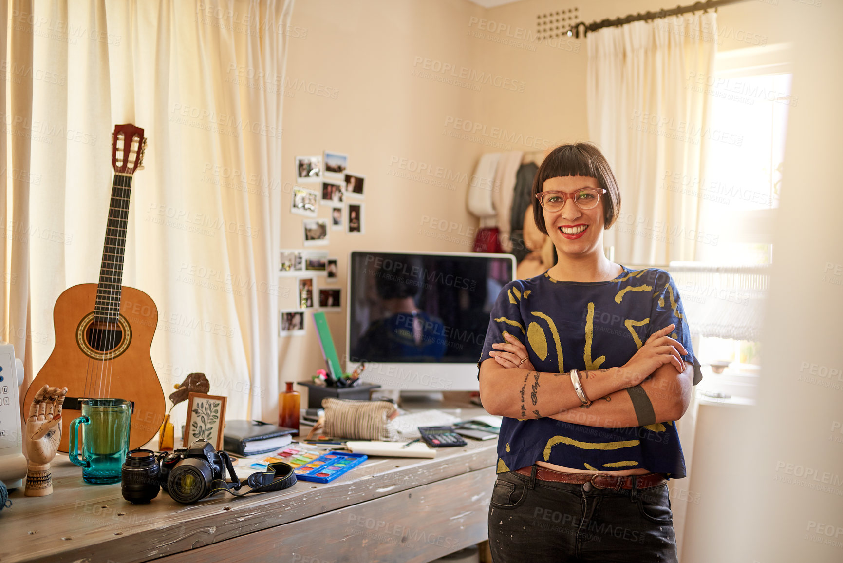 Buy stock photo Portrait of a stylish young designer standing in her eclectic studio