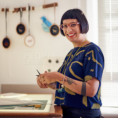 Buy stock photo Portrait of a stylish young designer at working at a table in her studio