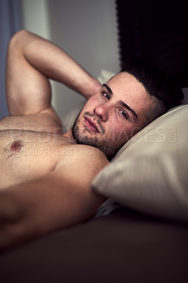 Buy stock photo Shirtless man, sensual and portrait with bed, bedroom and lazy morning with sexy look. Guy, waking up and seductive with desire, comfort and handsome topless dude with natural body for weekend break