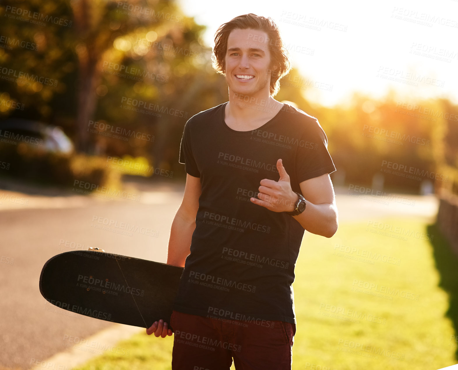 Buy stock photo Smile, portrait and skateboarder with shaka hand gesture outdoor for hobby, skill practice and cruising. Male person, happy and hang loose in summer for urban fun, freedom and extreme sports