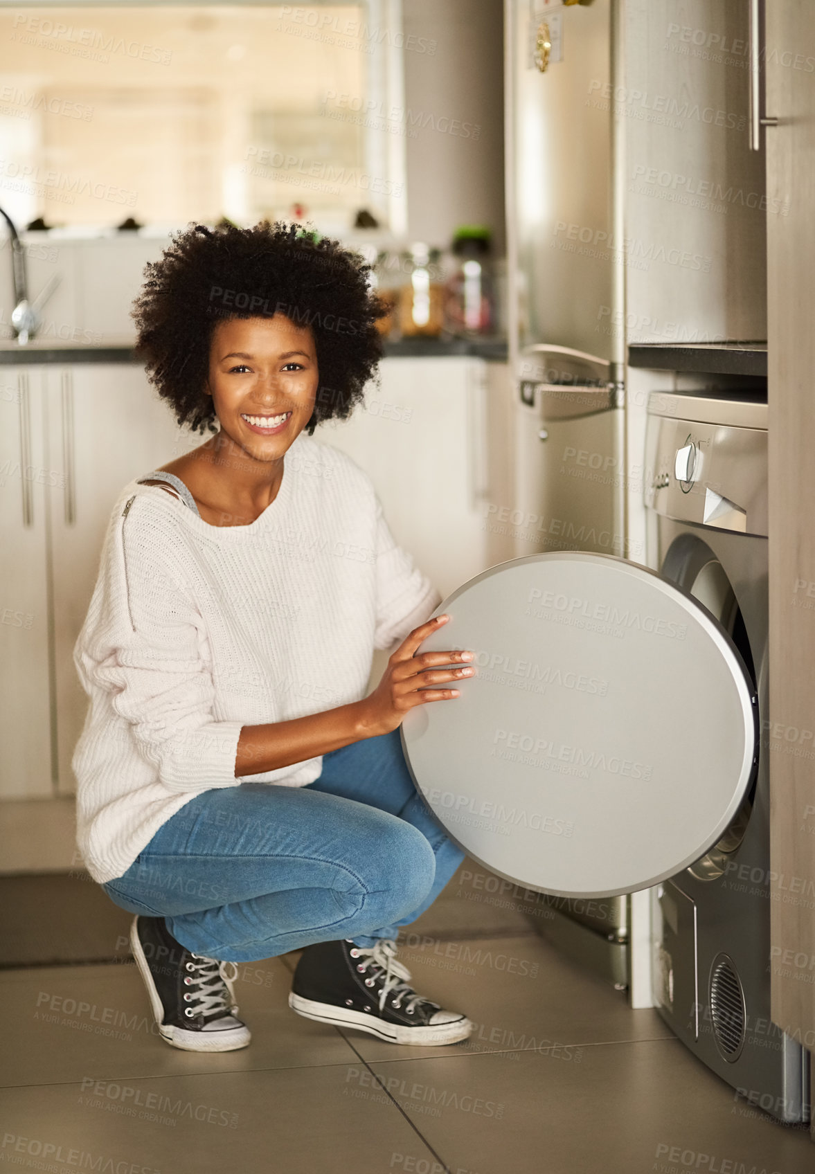 Buy stock photo Home, portrait and black woman with laundry machine for washing, cleaning clothes and housework. House, domestic work and happy girl with equipment for chores, preparing and electric appliance