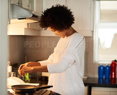 Buy stock photo Breakfast, cooking and egg with black woman in kitchen of home for diet, health or nutrition. Food, pan and stove with afro person in apartment to prepare morning meal for hunger or wellness